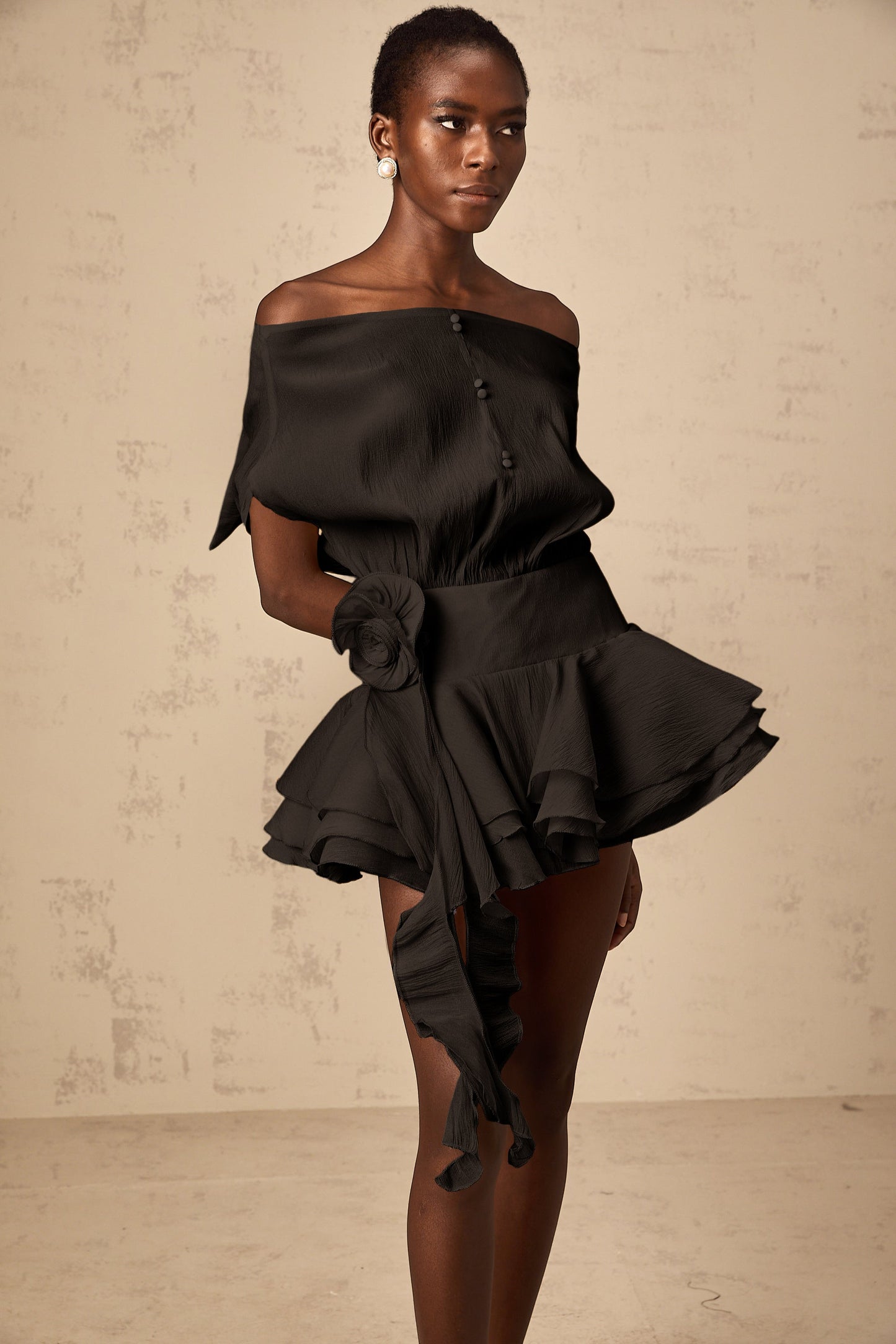 Amélie floral-appliqué flounced mini dress in Black