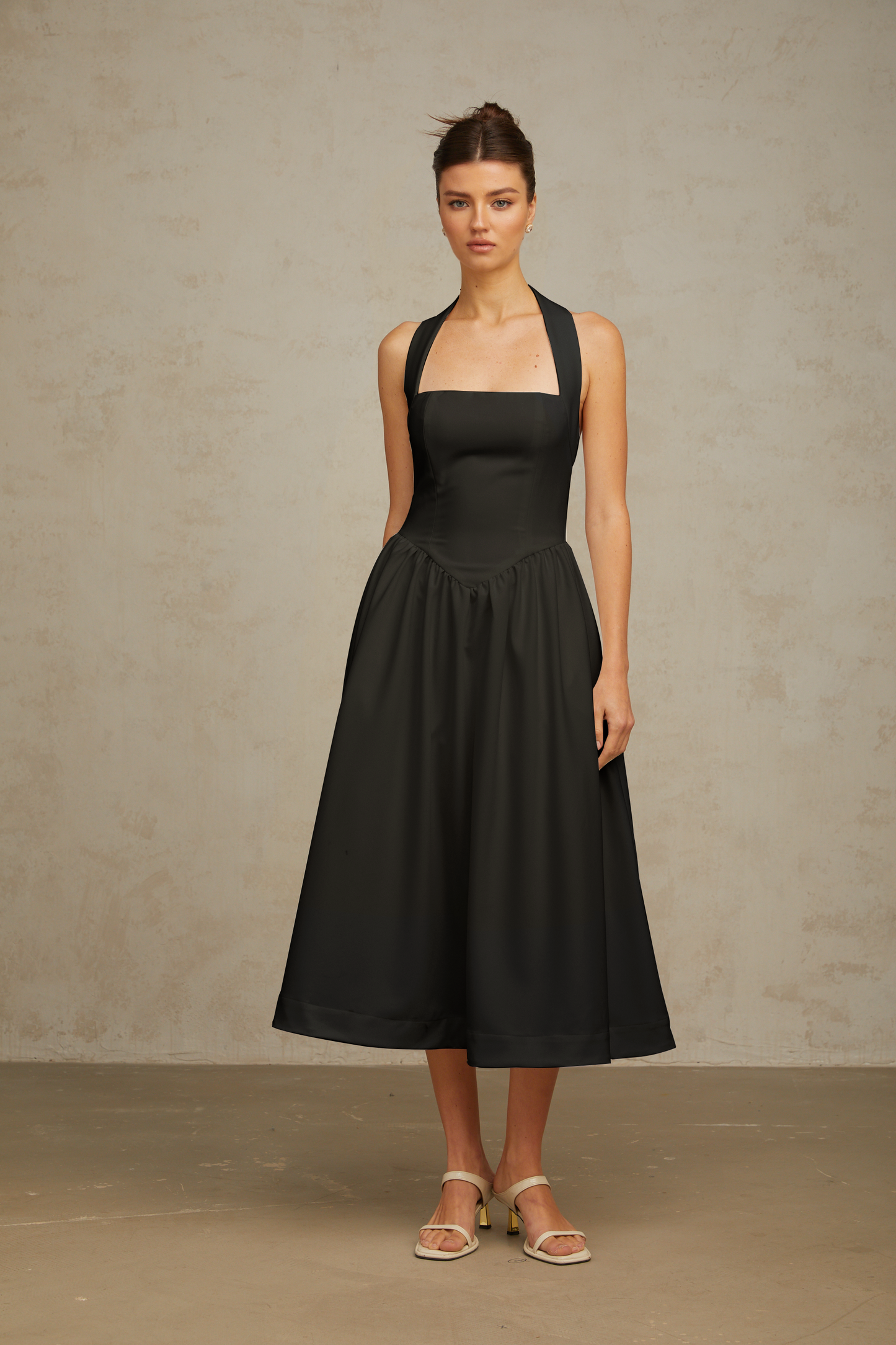 Alizée halterneck pleated midi dress in Black