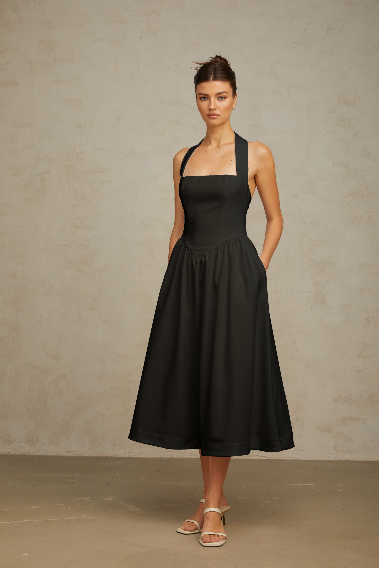 Alizée halterneck pleated midi dress in Black