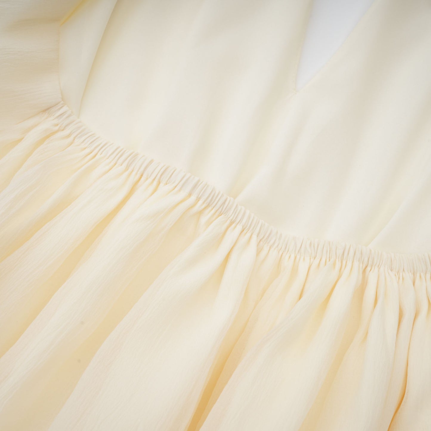 Bérénice white halterneck faux-pearl mini dress