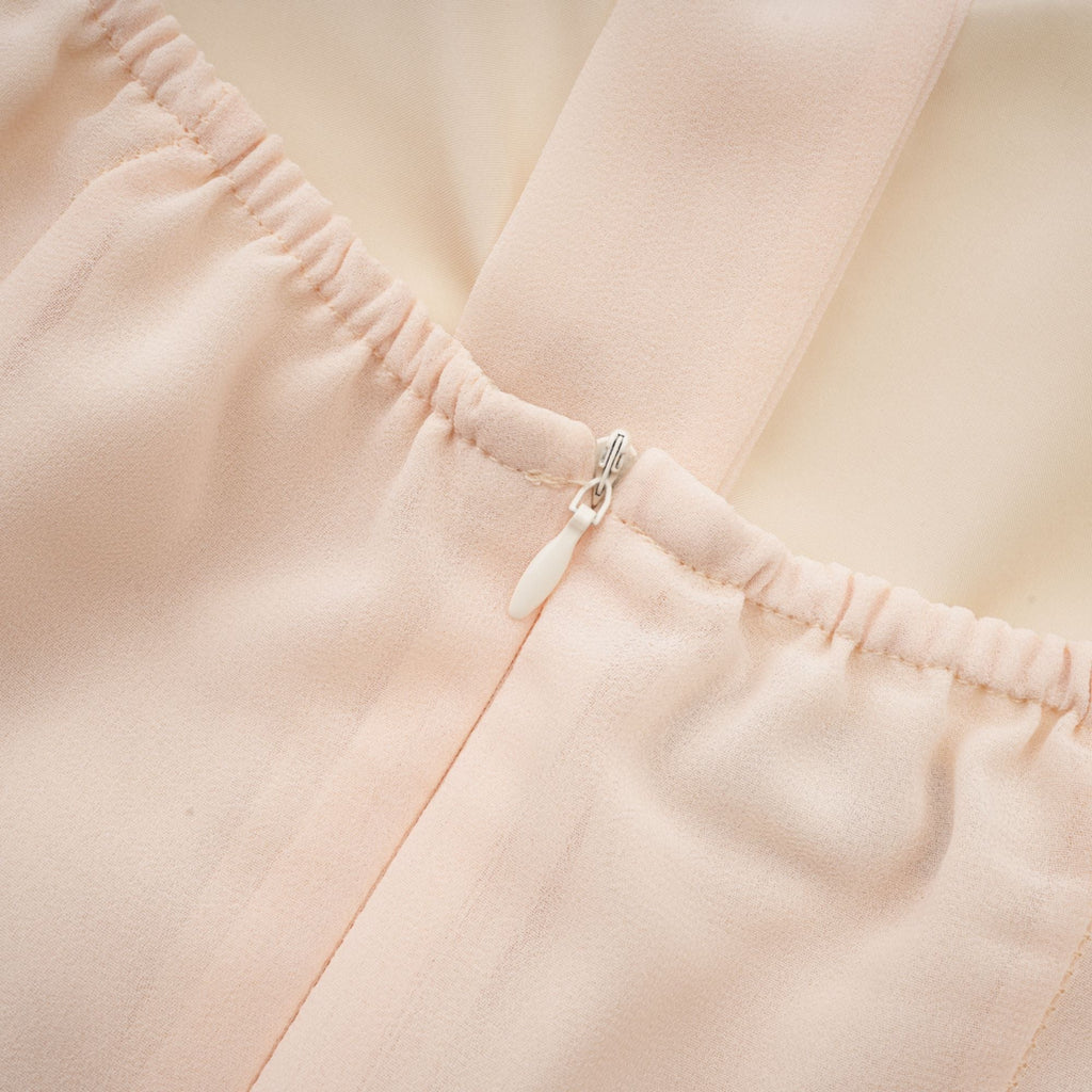 Esmerie Sleeveless Bustier Mini Dress with Back Tie Detail